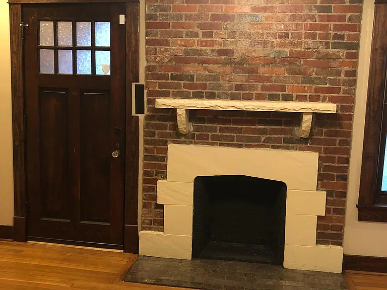 Restored original fireplace (NON FUNCTIONING ) Original Craftsman front door !