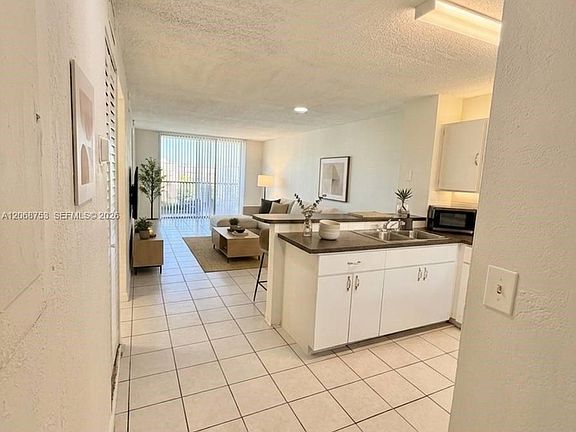 5th image of 8750 N Sherman Cir APT 505