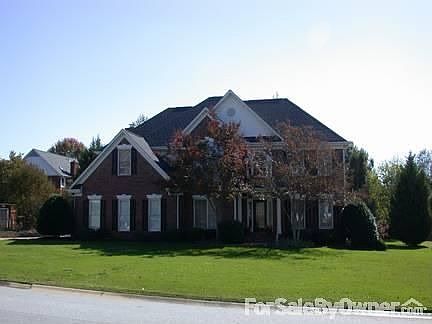 Front of House
						:
						Traditional Brick with Portico. Leaded glass front door. Large front yard.