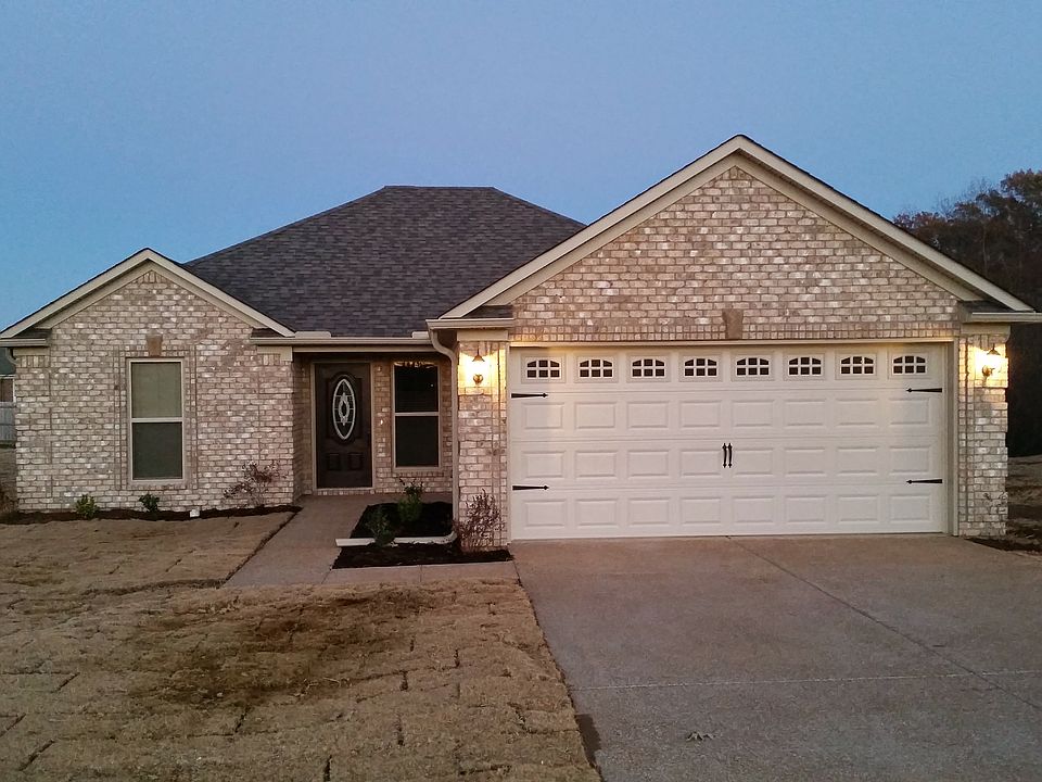 All brick, all electric, all tile, heat pump, overinsulated