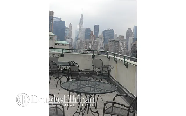 Sold by Douglas Elliman | media 18