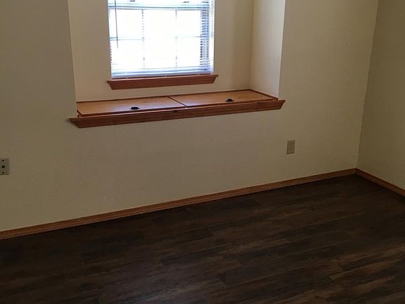 Bedroom with window box storage