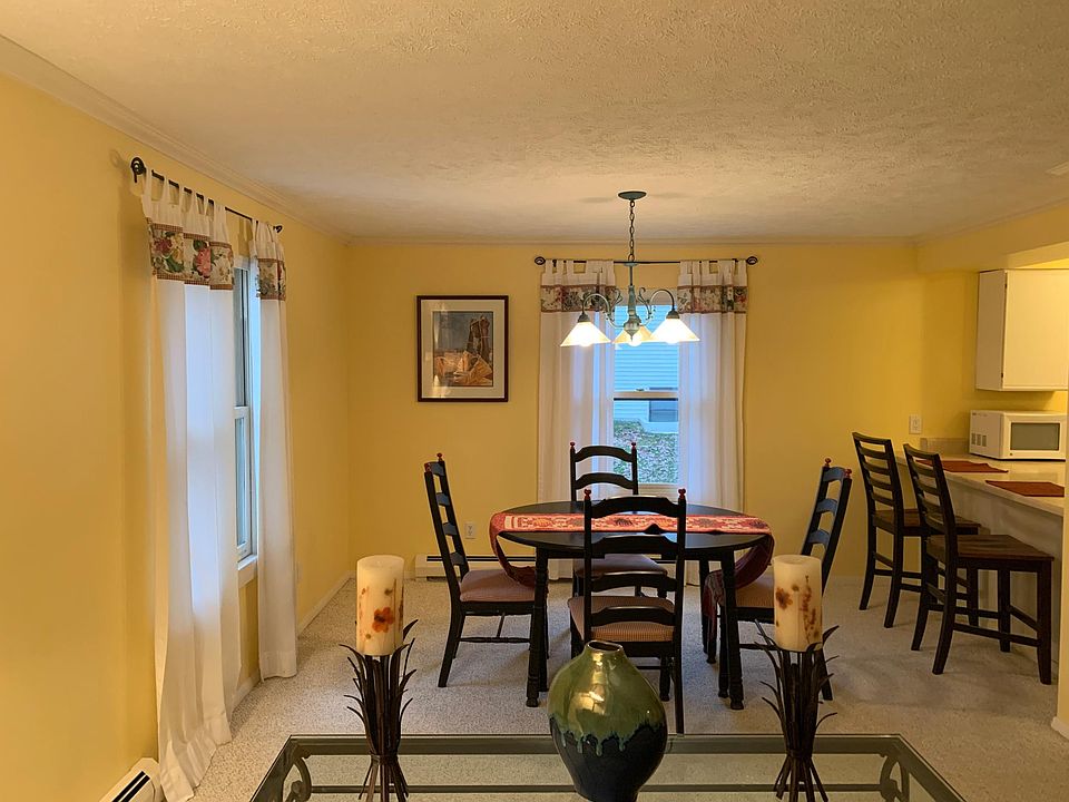 Dining room area. Floors have been changed to Luxury plank flooring.