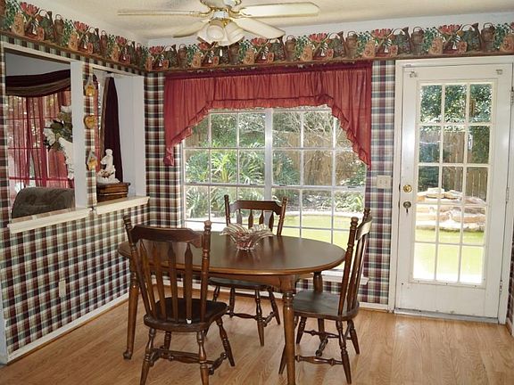 Sunny breakfast room overlooks the backyard with pool & spa!