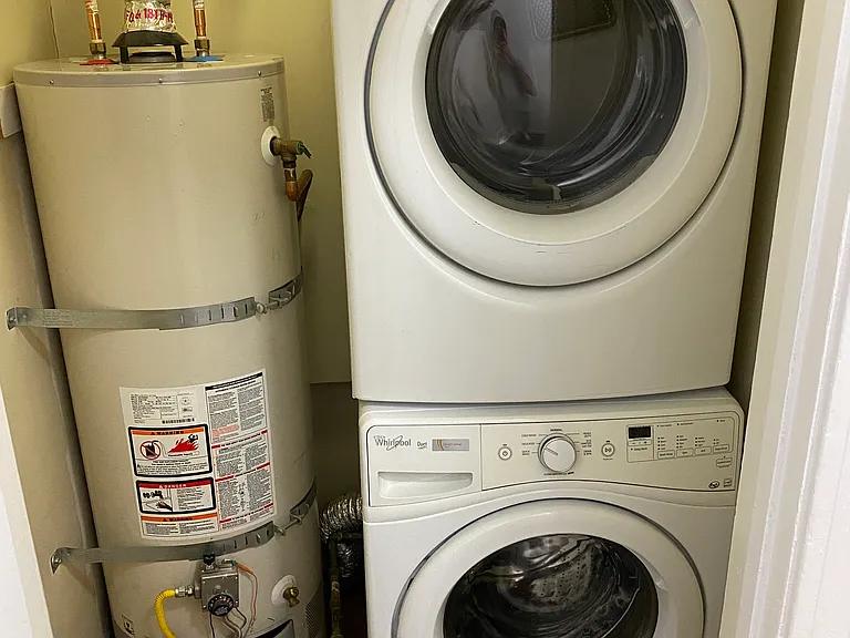 In-Unit Laundry Room with Top Brand Front Loading Energy Efficient Laundry and Gas Dryer
