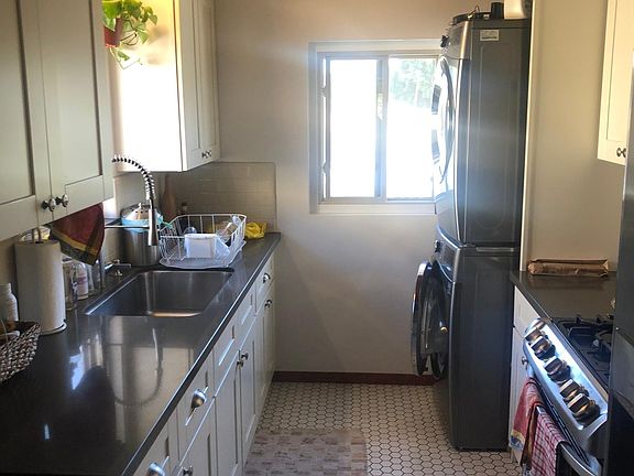 New tile floor with new quartz counters