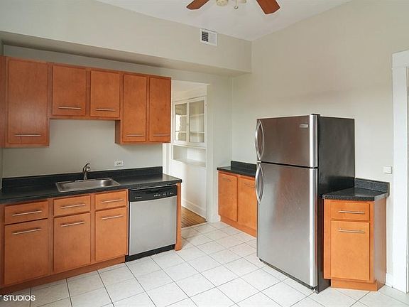 Kitchen with stainless appliance - including dishwasher