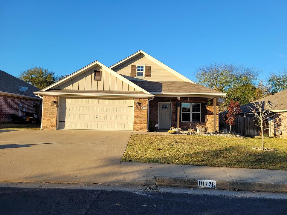 Welcome home! Wide driveway with extra parking.