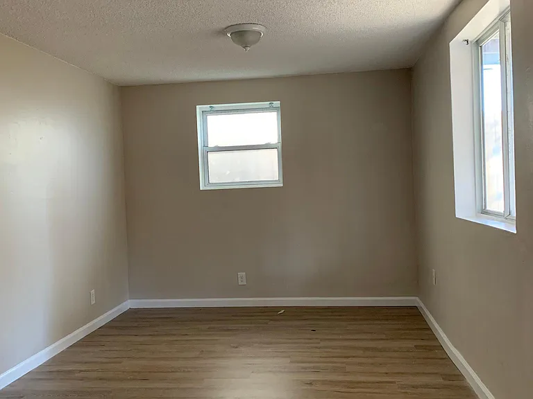 back larger bedroom