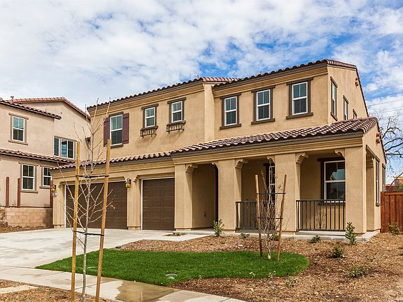 Fresh Landscaping borders the Front Porch