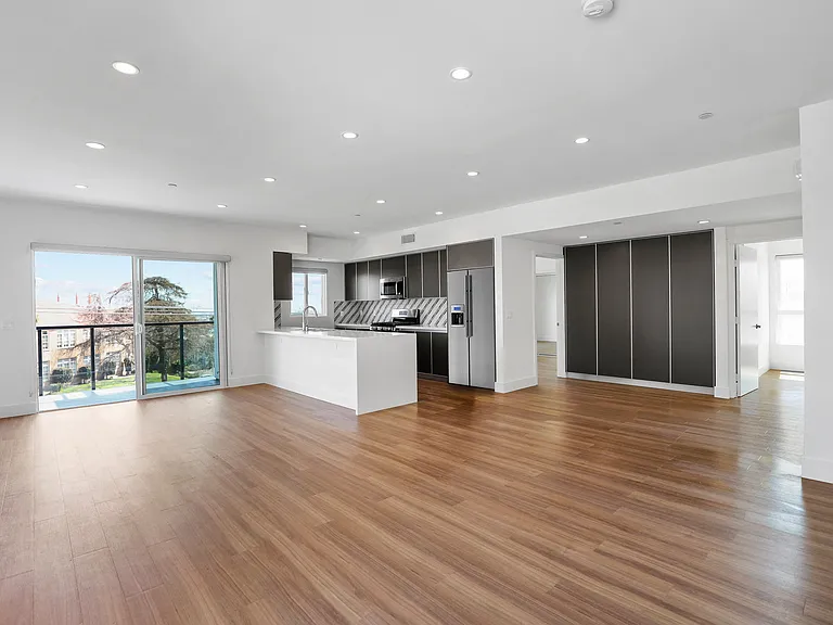Kitchen, Dining, and Living Room Area with Patio