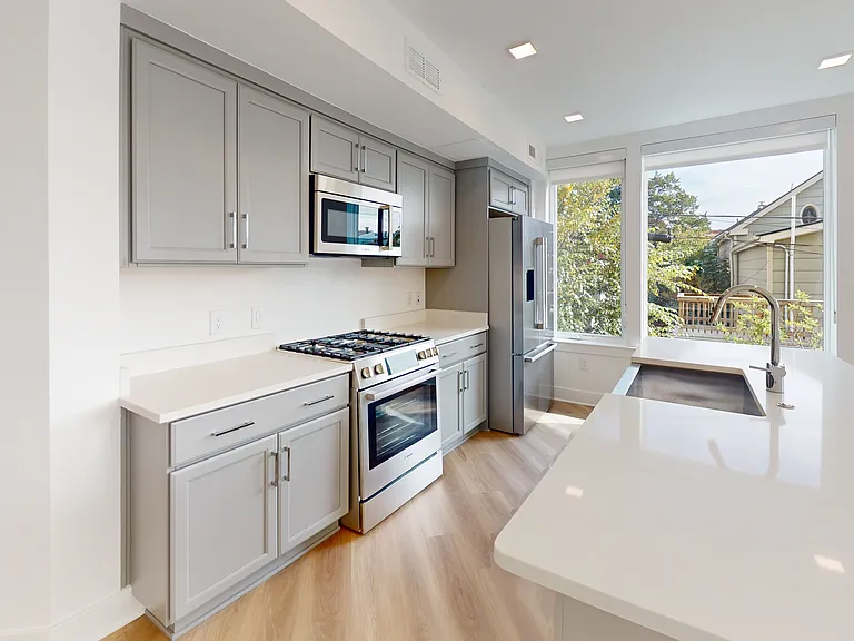 Stainless Steel Bosch Appliances. Gas cooktop/ Deep Sink/ 36" Double Fridge.