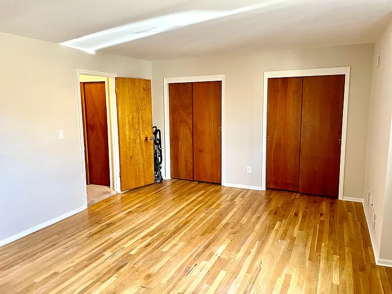 First half of primary bedroom