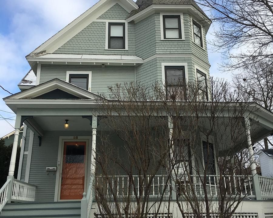 Three floors of amazing living space and large front porch.