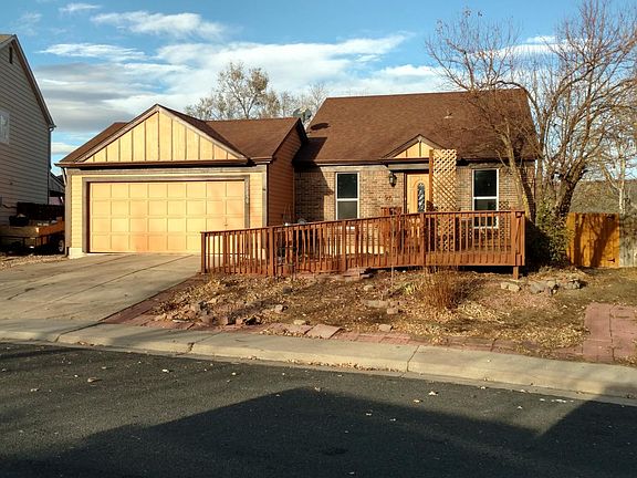Outside with wheelchair ramp to front door