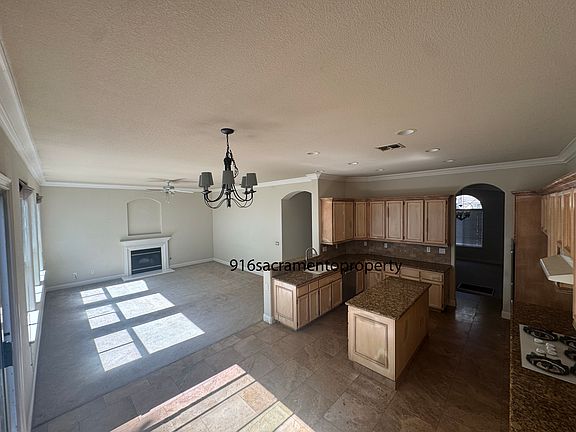 Dining nook area looking into family room and kitchen