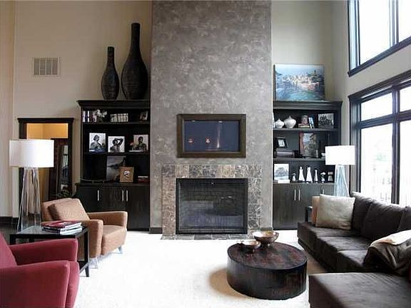 Great Room: View looking into GR from Kit. Fireplace flanked w/Built-Ins.