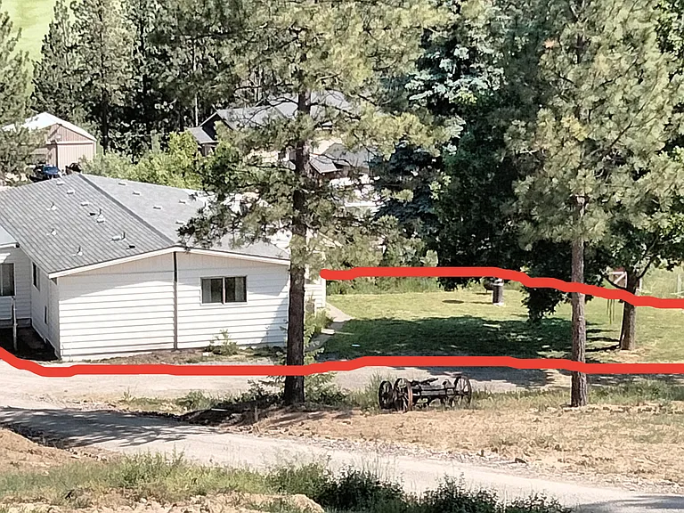 View of house with rental space outlined in red.