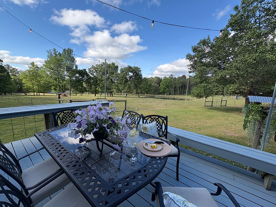 Deck with a million dollar view of pasture and ponds __