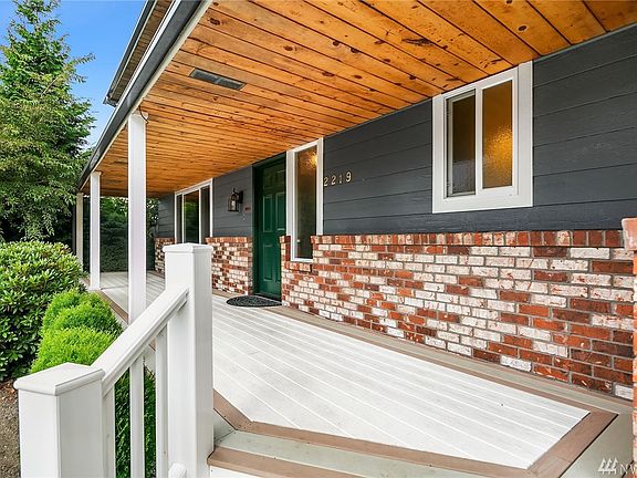 New low maintenance decking on this huge covered front porch! 