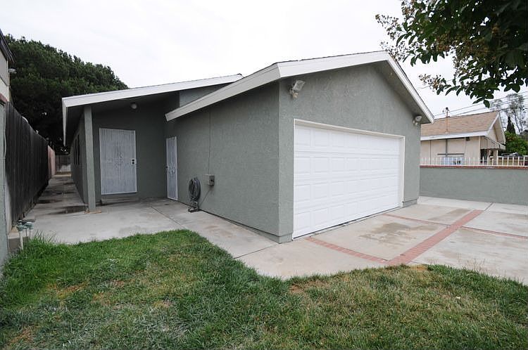 front of home inside gate