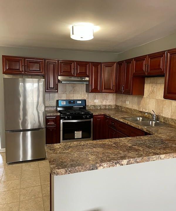 Cherry wood Cabinets,Stainless Steel Appliances