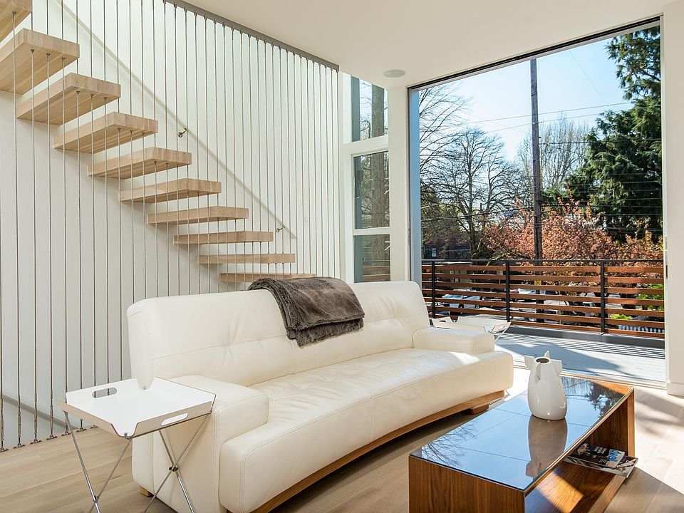 Living room with "floating" stairs
