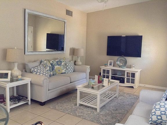 living room with vaulted ceiling