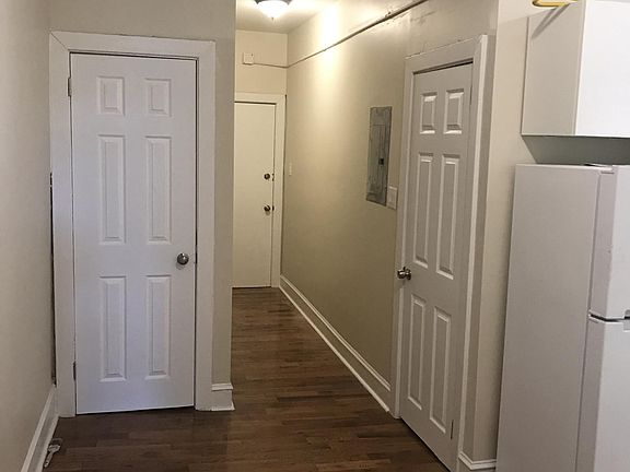 Hall bathroom door and storage closet