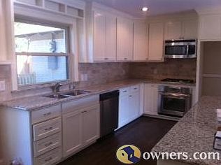 NEW KITCH WITH STAINLESS APPLIANCES AND GRANITE