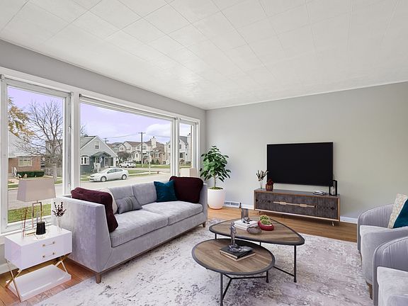 5th image of 6007 S Melvina Ave