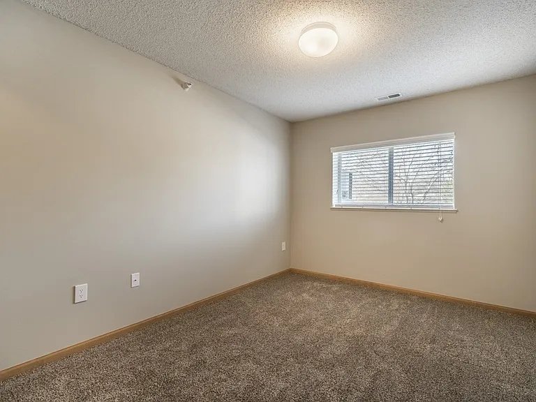 Our spacious bedrooms are filled with natural light.