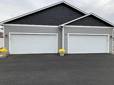 Attached garage, entry on left side