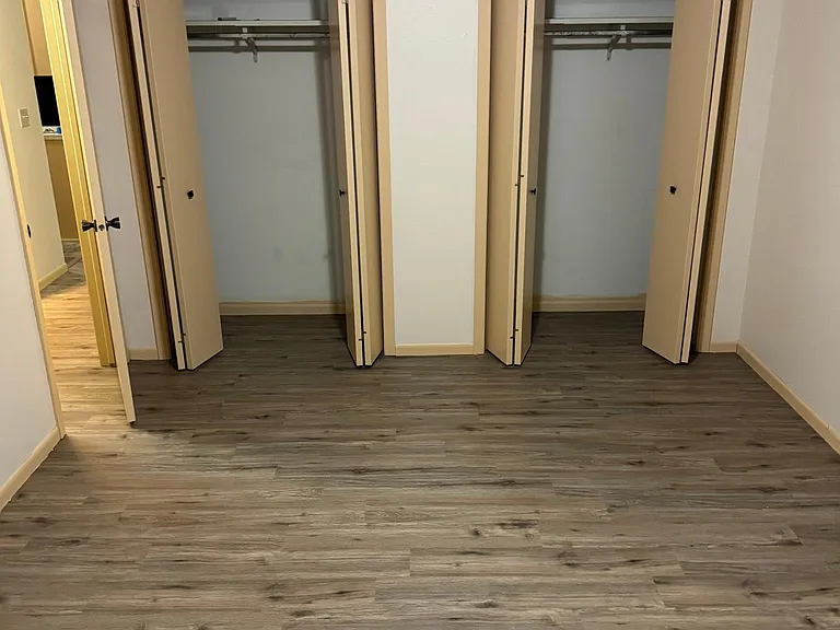 Master bedroom his and her closet