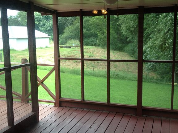 Screened deck with barn view
