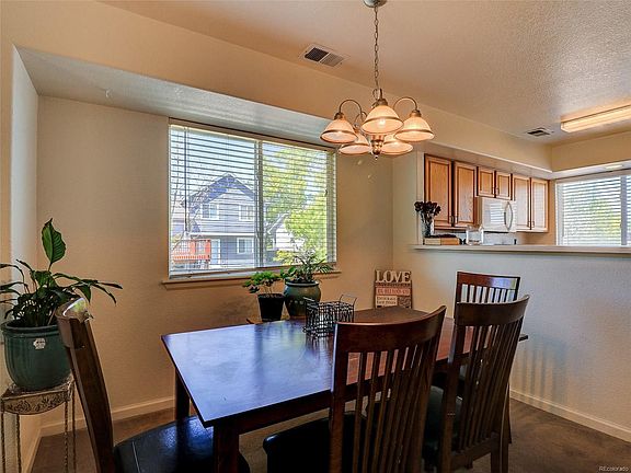 LARGE DINING AREA OPEN TO THE KITCHEN AND FAMILY ROOM