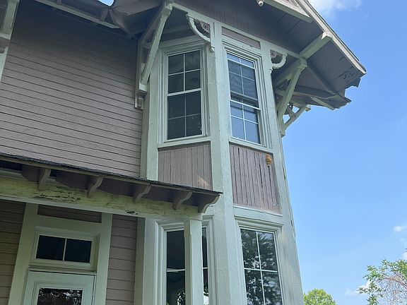 Downstairs bay window to dining room/parlor & upstairs bay window to bedroom II.