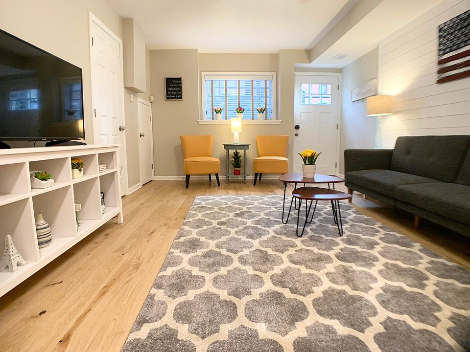 Spacious Living room with hardwood floors throughout.