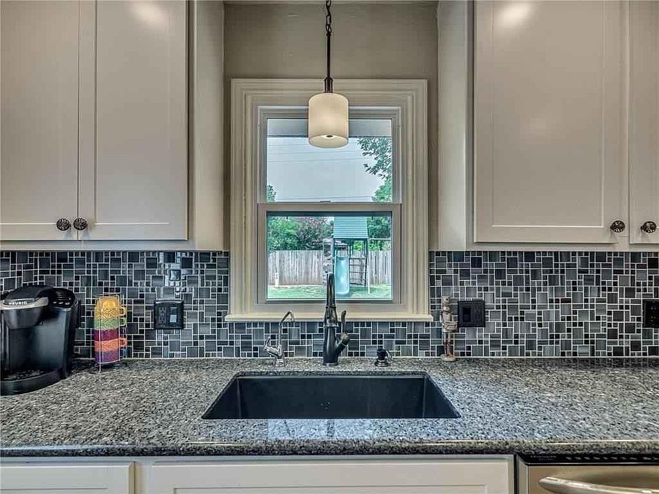 New kitchen cabinets, granite countertops, tile, sink, faucets, and all new appliances, including refrigerator and microwave!