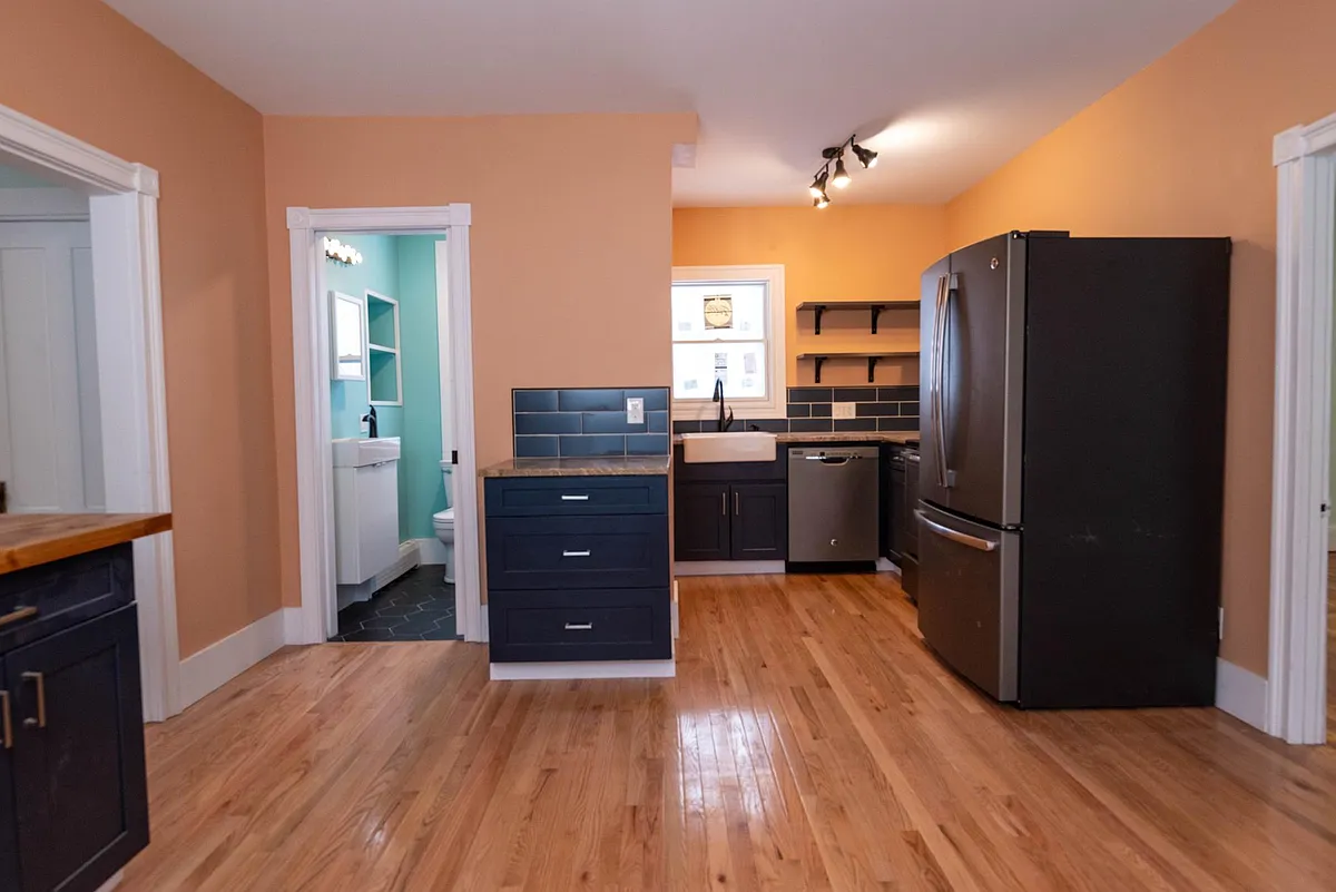 kitchen view from dining area - 63 Pike St #1