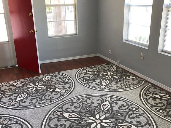 Living Room with tons of natural light and area rug