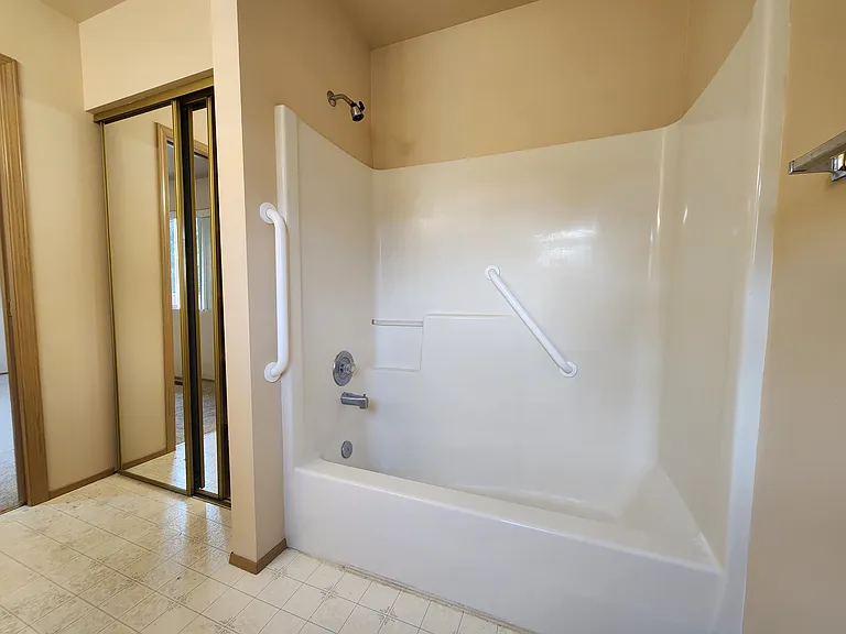 Master bath with large linen closet
