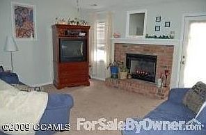 Vaulted Living Room
						:
						Gas fire place includes tank.