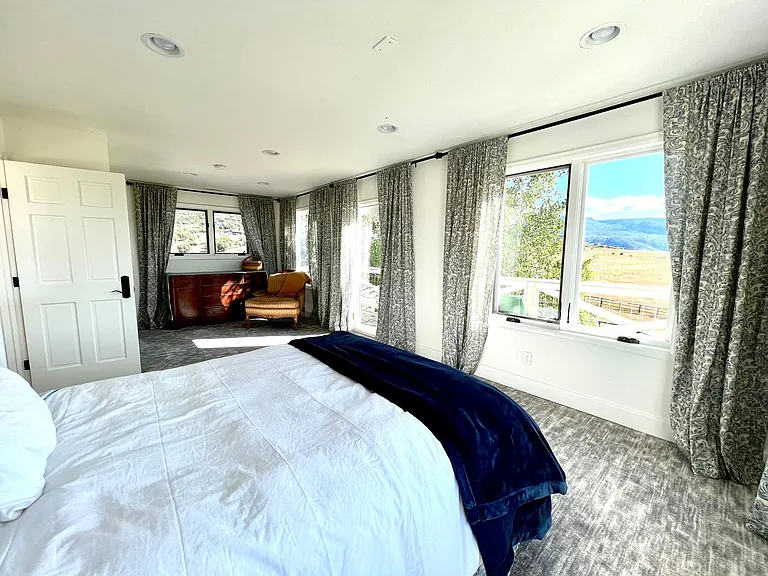 Upstairs master with private deck.