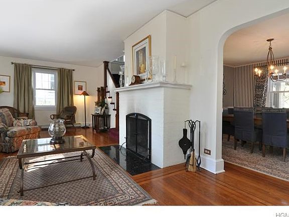 Another view of living room and entrance to dining room