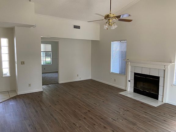 Living room with office or another bedroom off of it