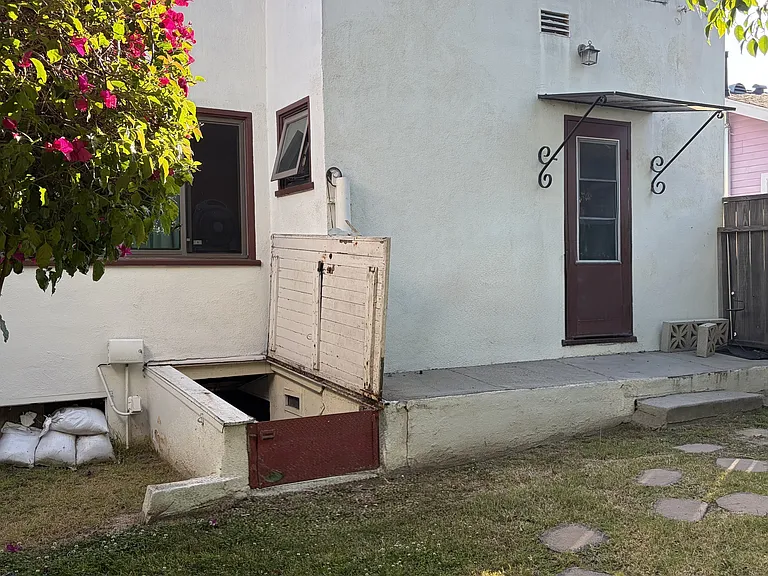 Backyard facing basement