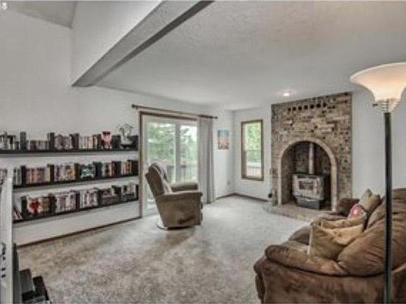 Sunken Living Room with Backyard Access