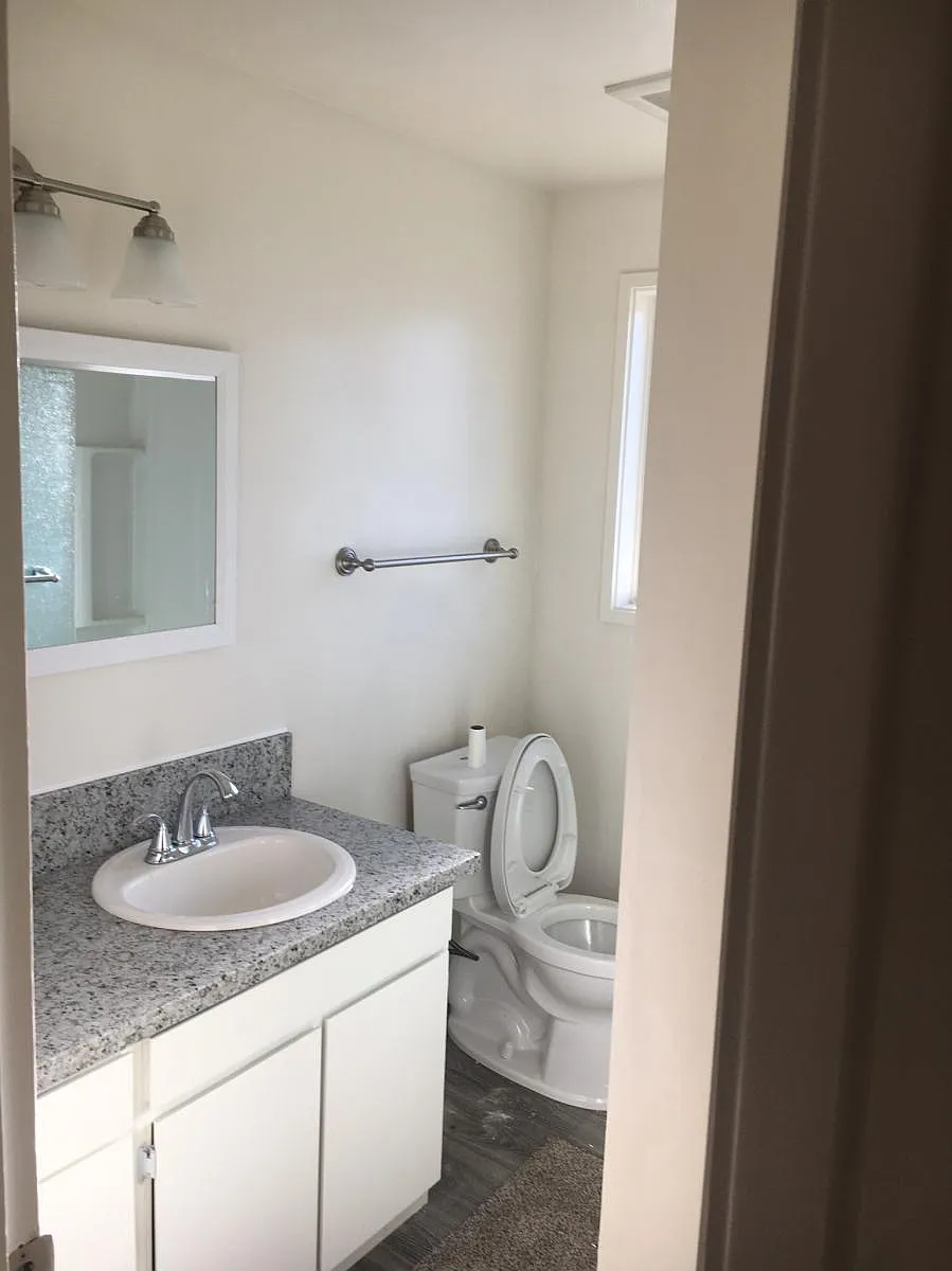 New bathroom granite, shower doors, flooring - 620 Queen Ave SE