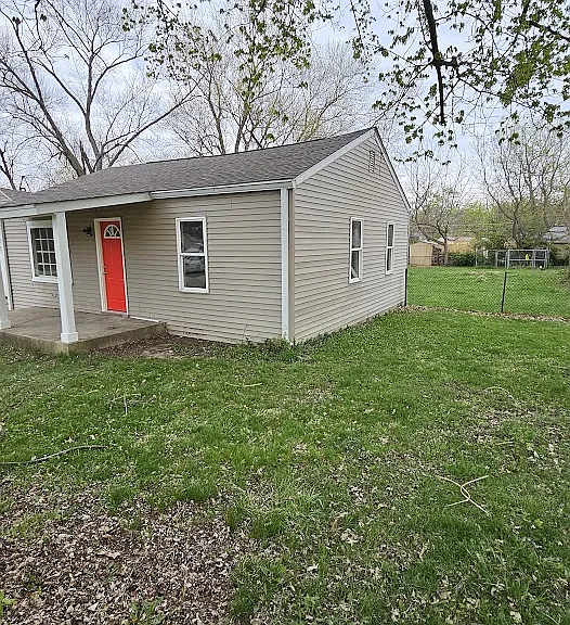 Side view of fenced yard